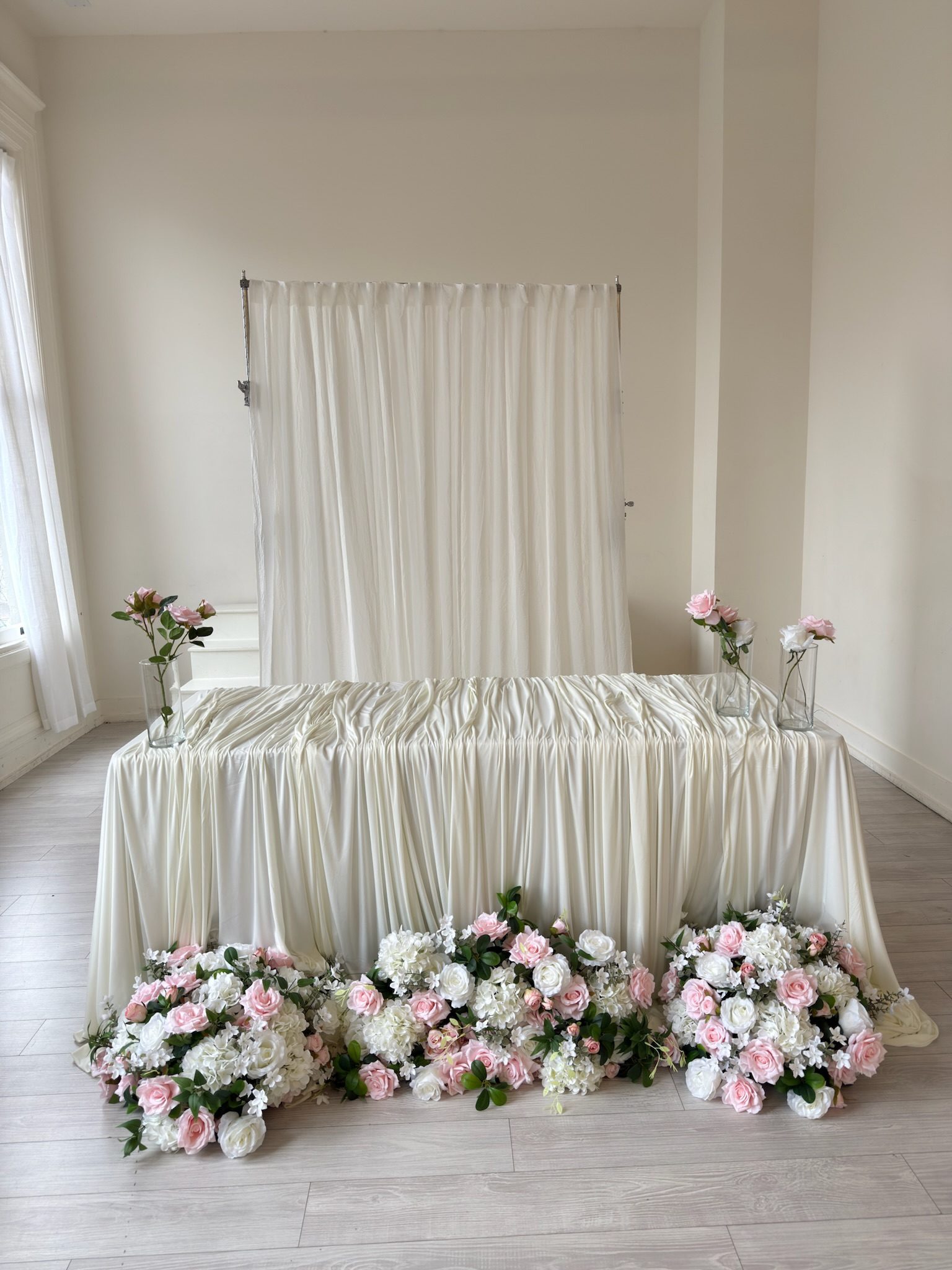 Ceremony backdrop draping installation